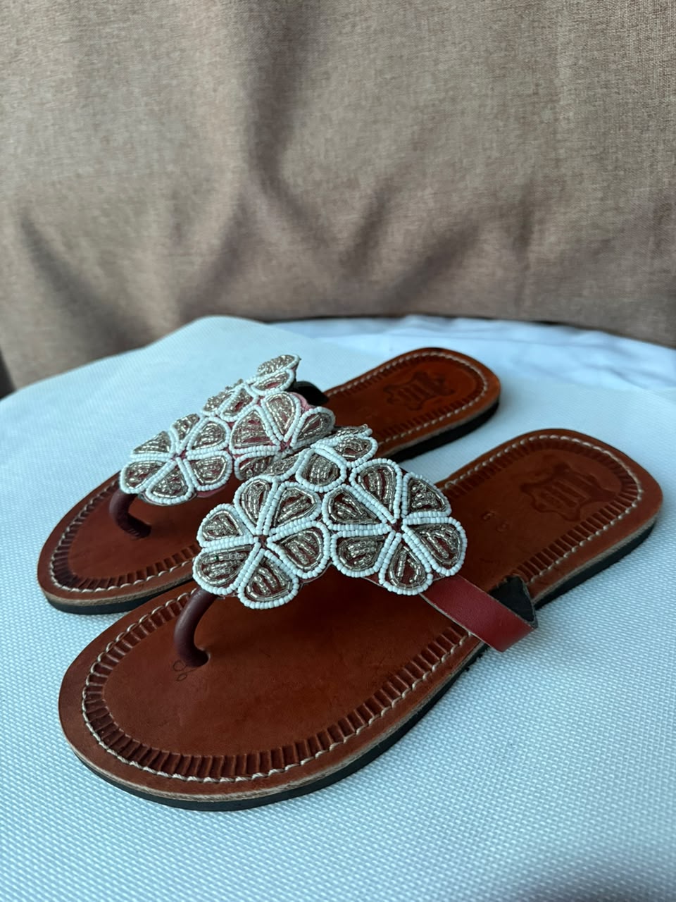 Ivory Blossom sandals angled view