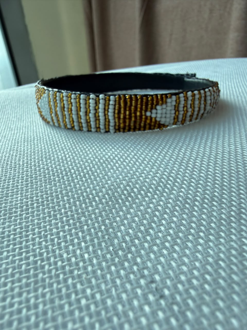 Ivory and gold hand-beaded headband front