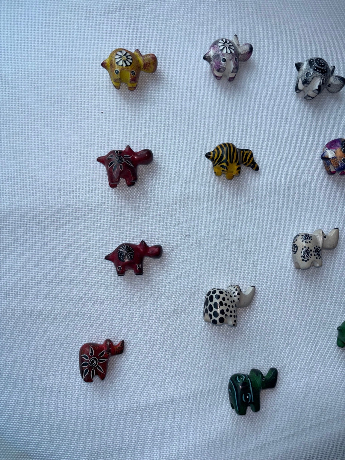 Assorted hand-painted mini animal sculptures