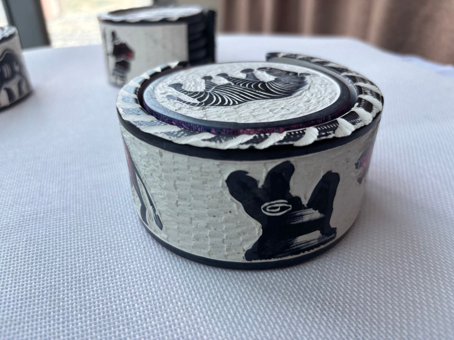 Round trinket box with elephant motif