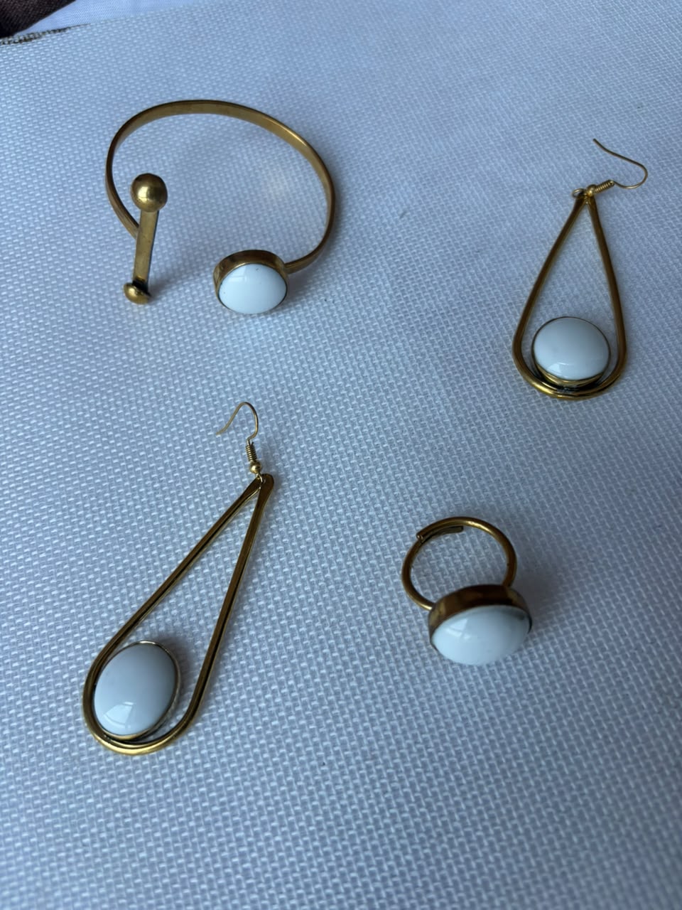 Lady in White jewelry set — gold bracelet, teardrop earrings and ring with white stone accents