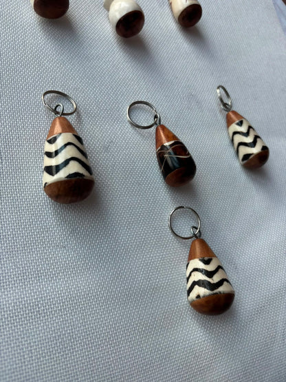 Calabash Carved Keychain — multiple chevron stripe designs laid out