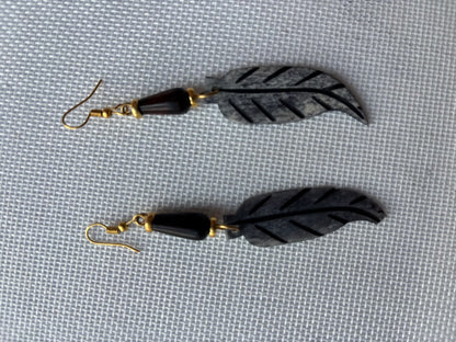 Dark Carved Bone Feather Earrings — second angle