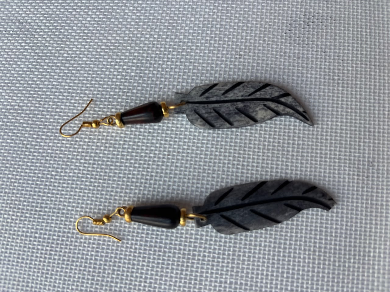 Dark Carved Bone Feather Earrings — wood bead and gold wire