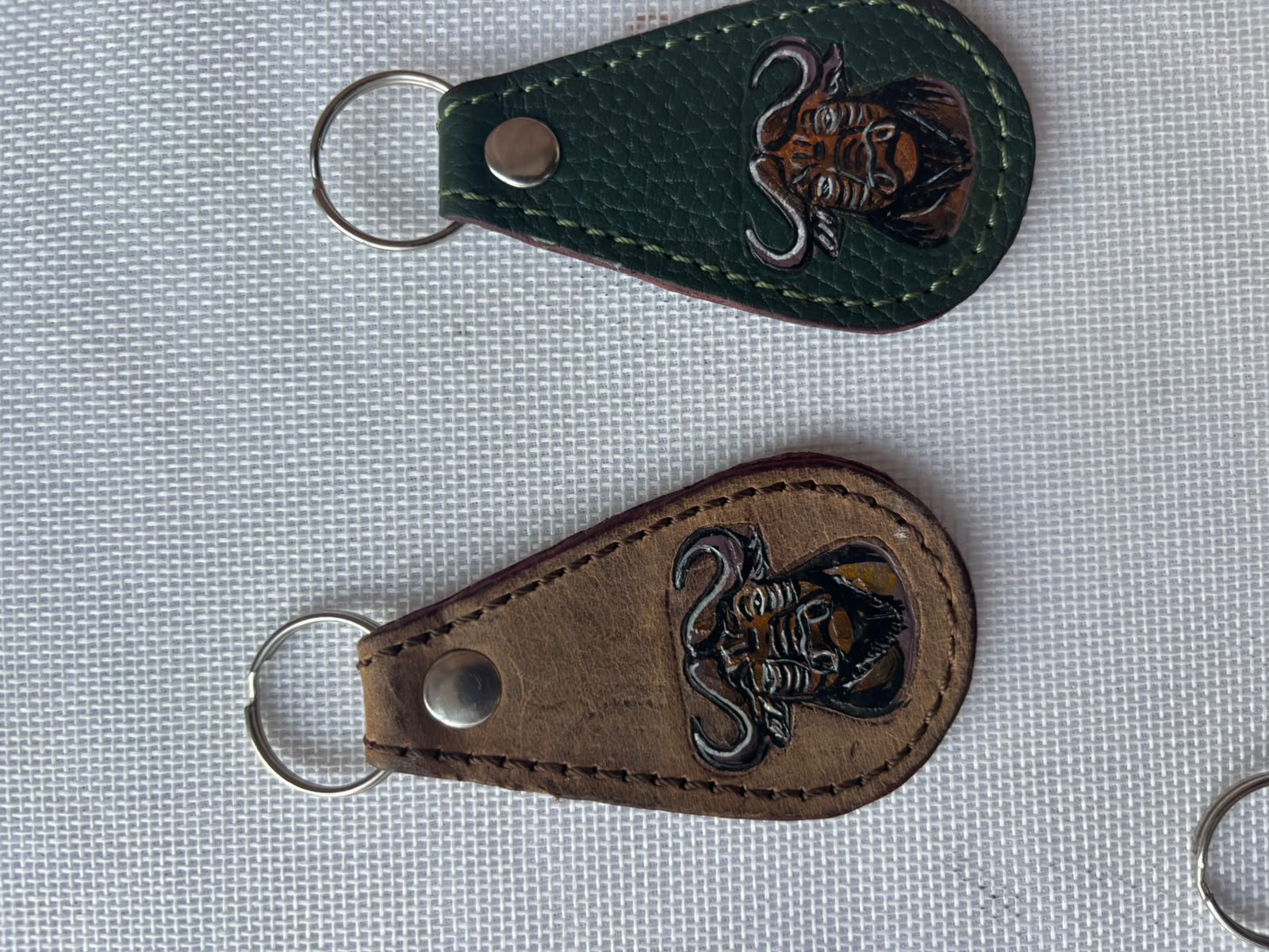Buffalo Soldier Keychain — green and brown leather with embossed emblem