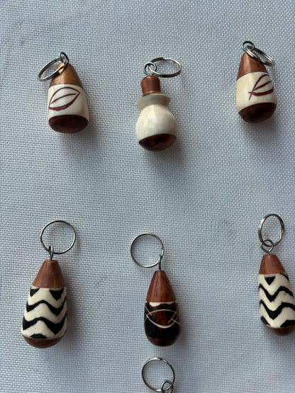 Calabash Carved Keychain — assorted designs including leaf and chevron motifs