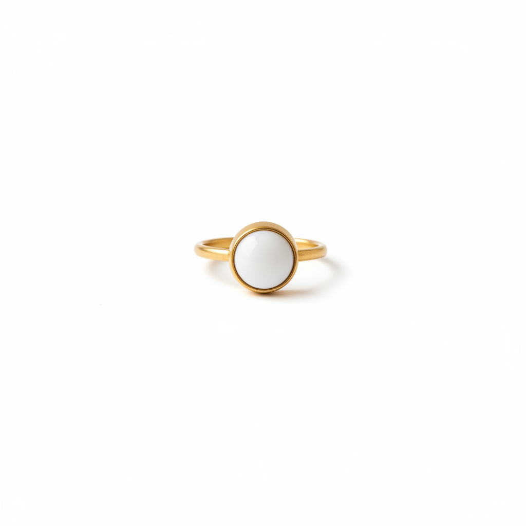 The Lumière Set — gold ring with white stone, product shot