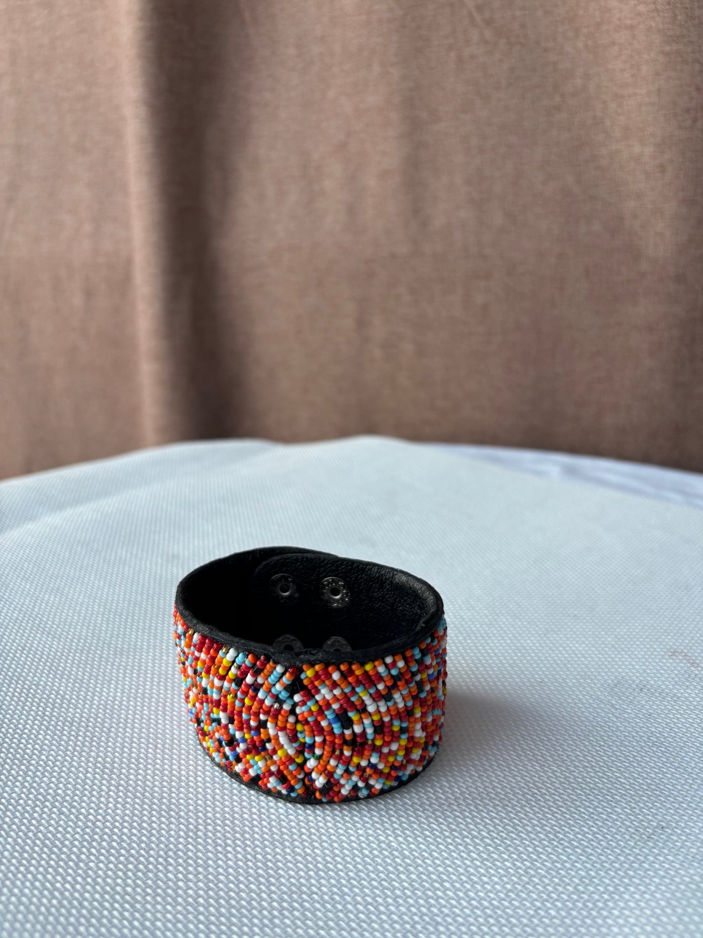 Hand-beaded multicolour cuff bracelet side detail