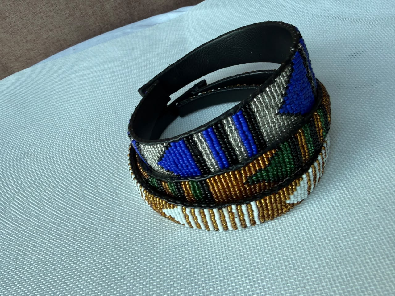 Four Sahara hand-beaded headband designs