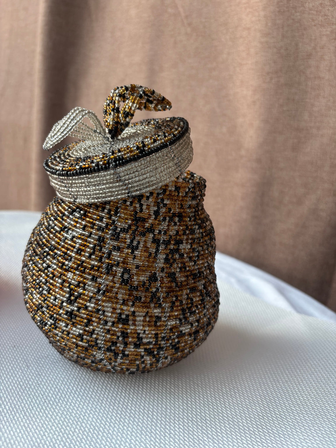 Bronze black and silver hand-beaded keepsake pot with sculptural lid