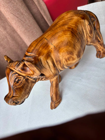 Hand-carved wooden buffalo sculpture second side