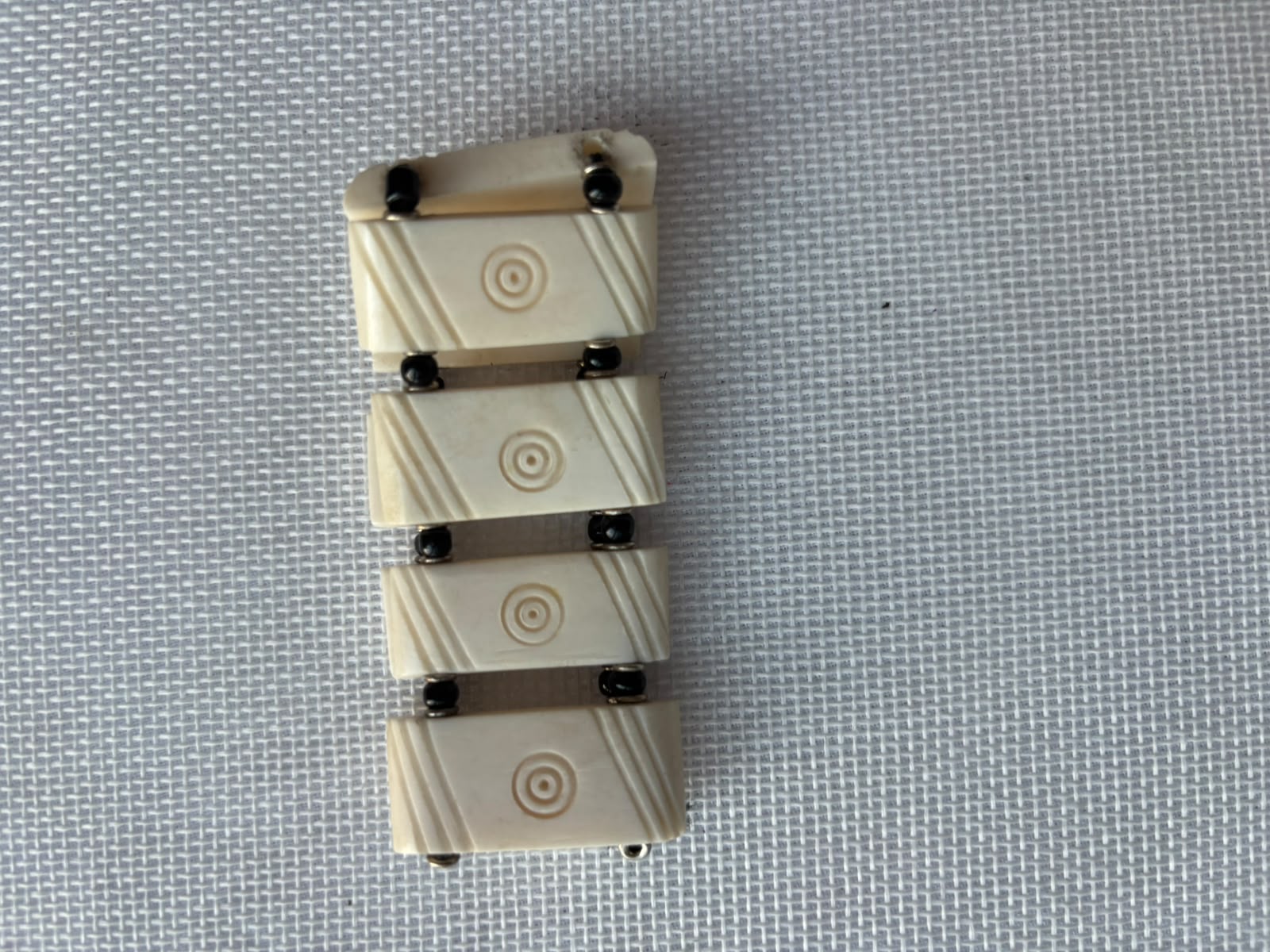 Ivory Orbit carved bone bracelet