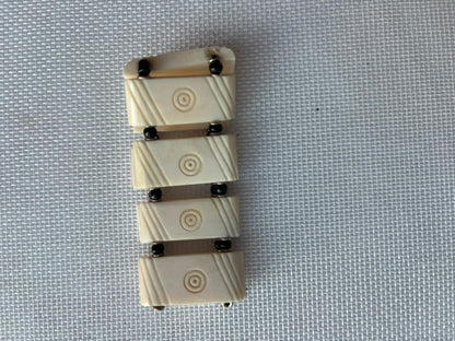 Ivory Orbit carved bone bracelet