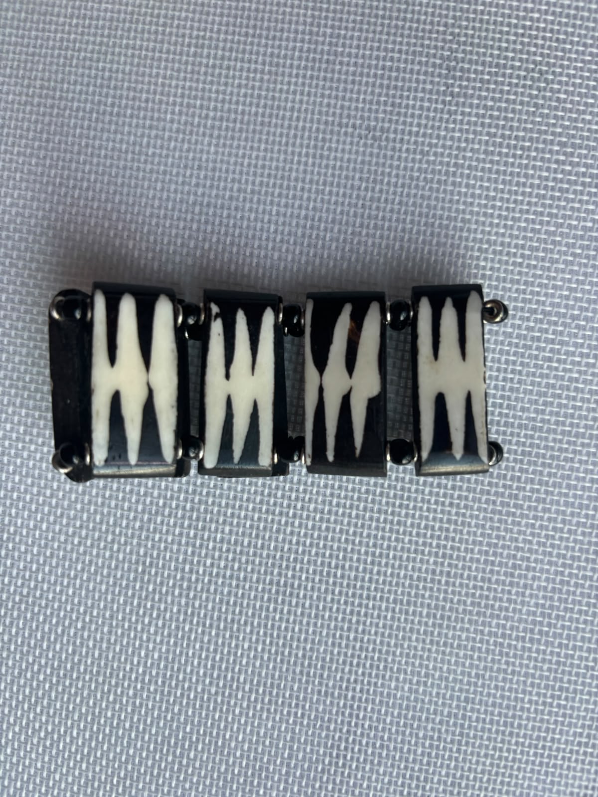 Ancestral Mark carved bone bracelet