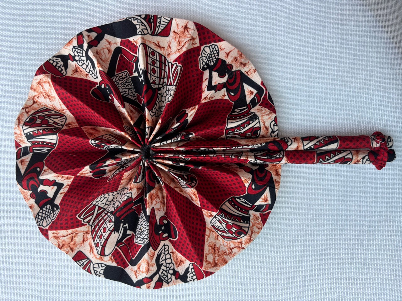 Dashiki print folding fan blue and cream dashiki fan front view