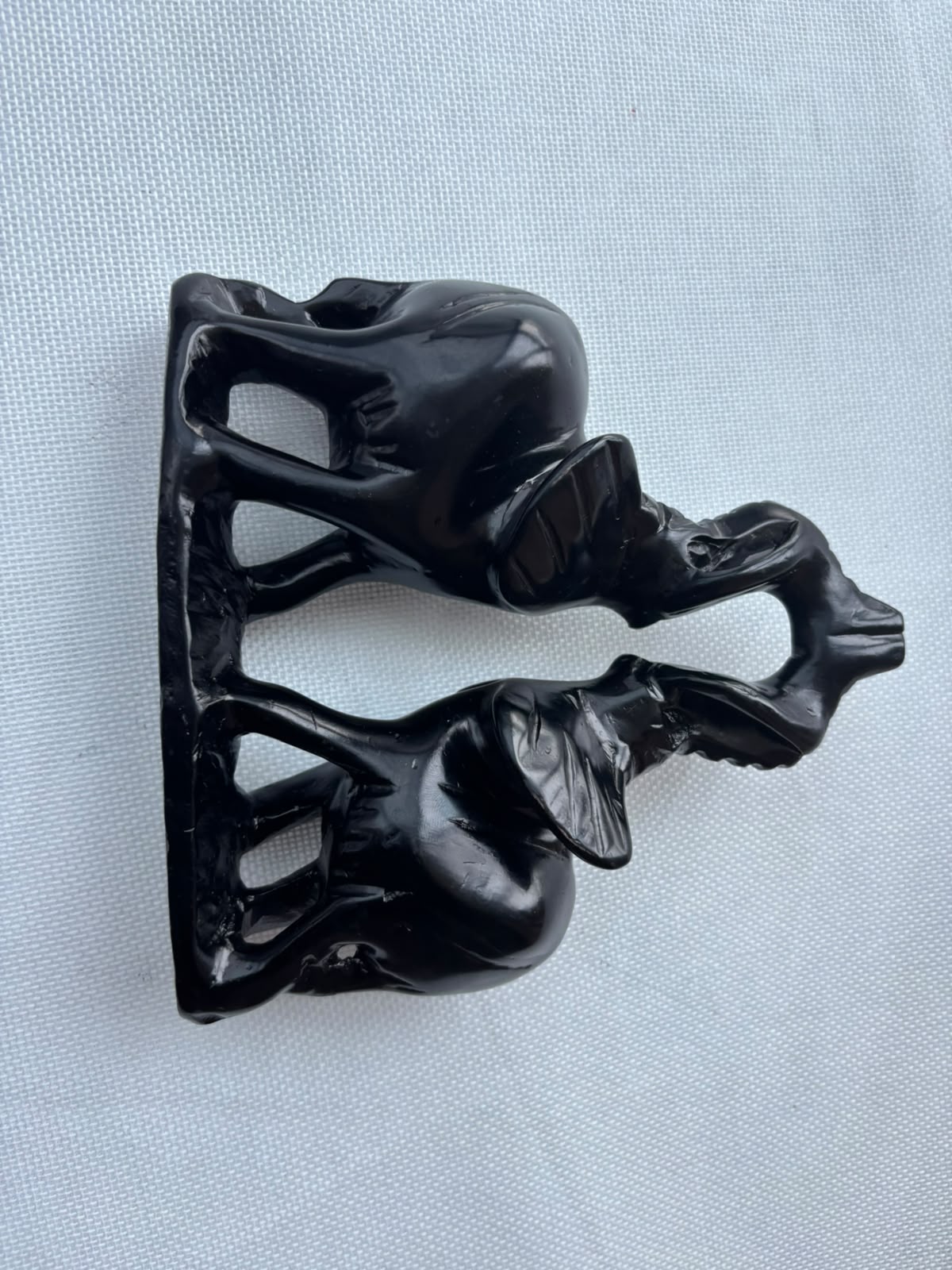 Black elephant pair sculpture side view
