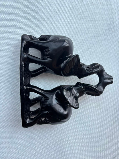 Black elephant pair sculpture side view