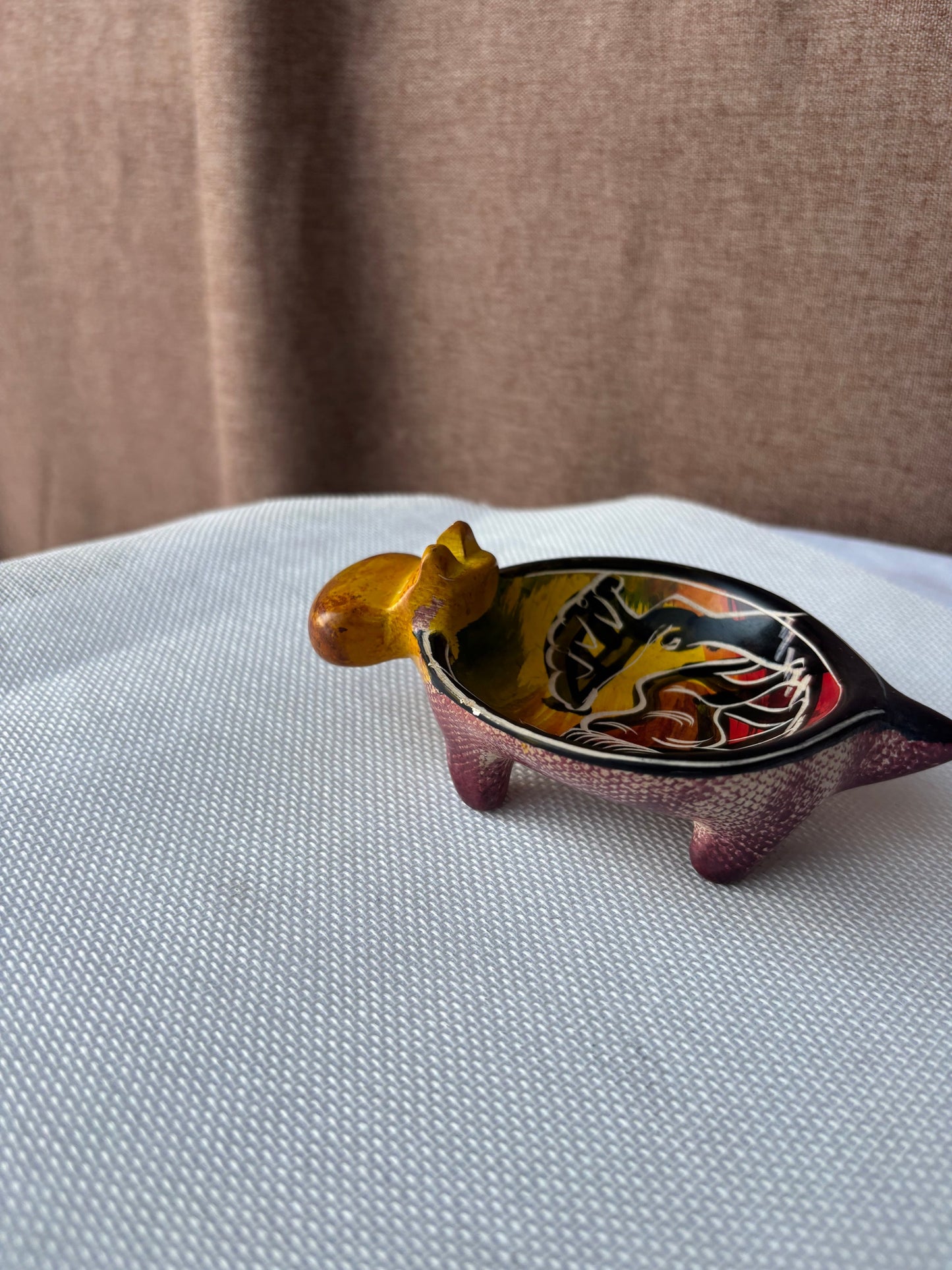 Ochre hand-painted safari ashtray top view