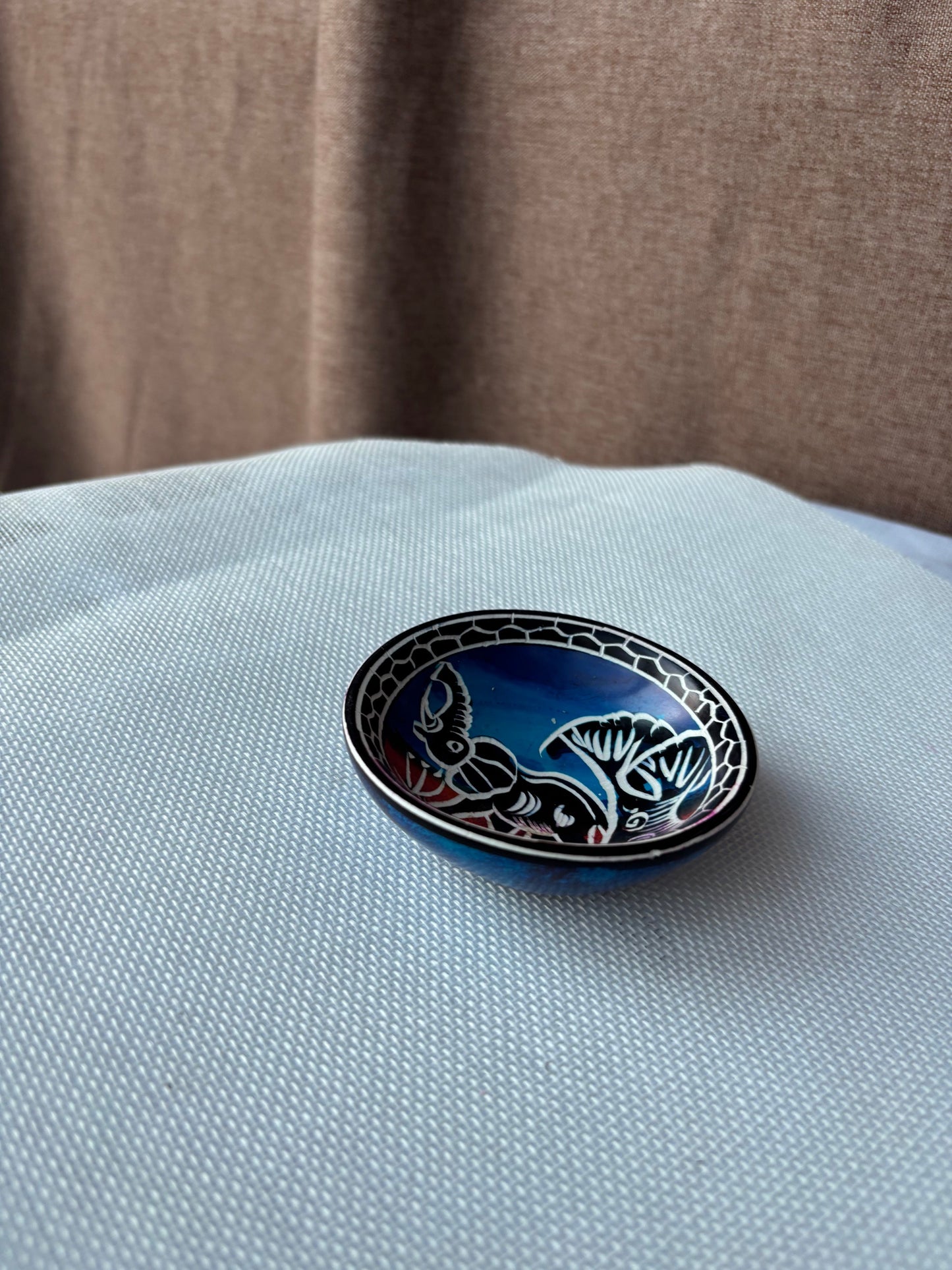 Blue and red hand-painted safari ashtray