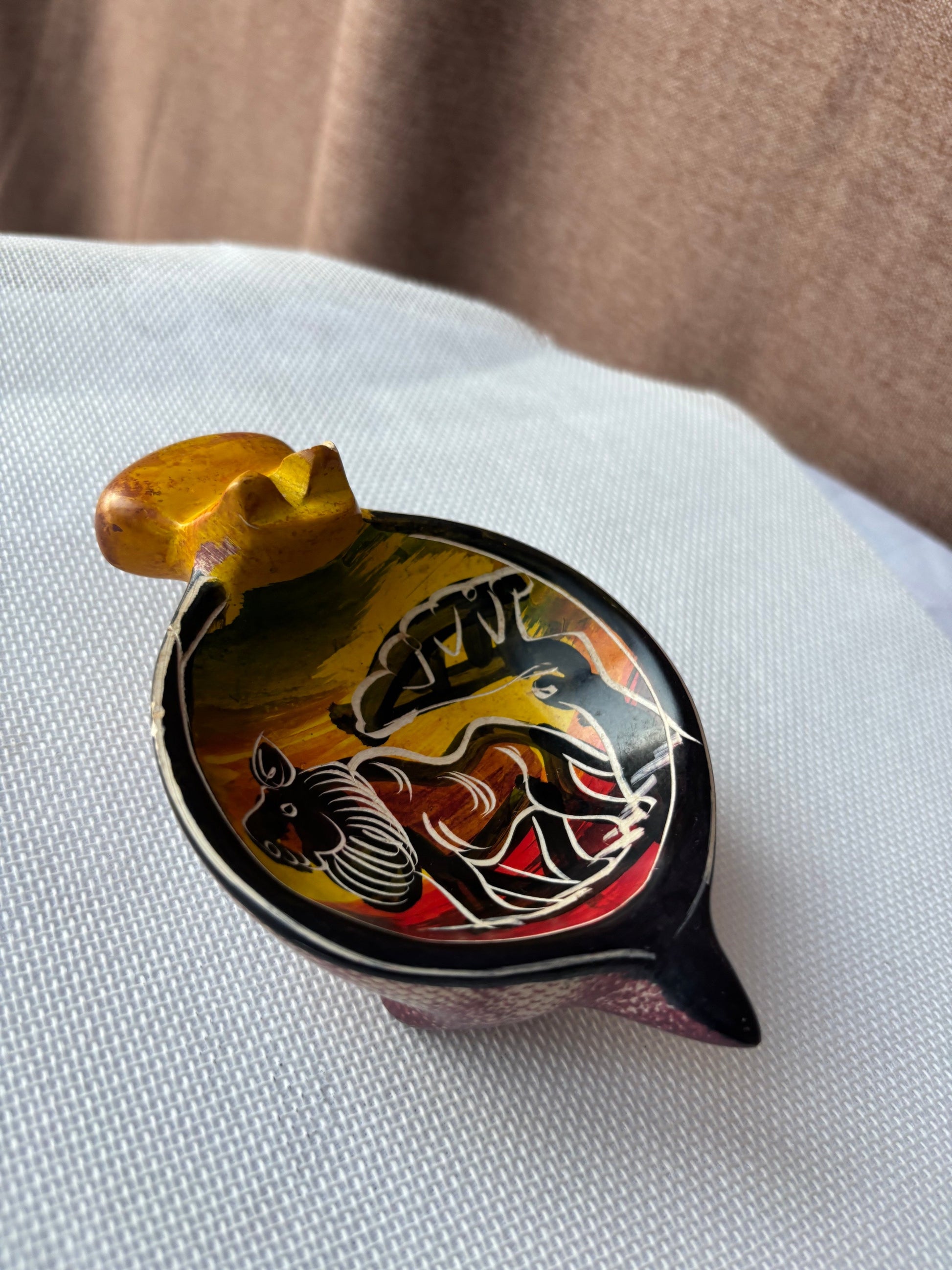 Ochre hand-painted safari ashtray with animal motif