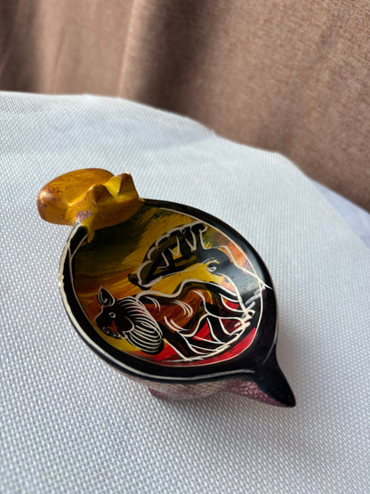 Ochre hand-painted safari ashtray with animal motif