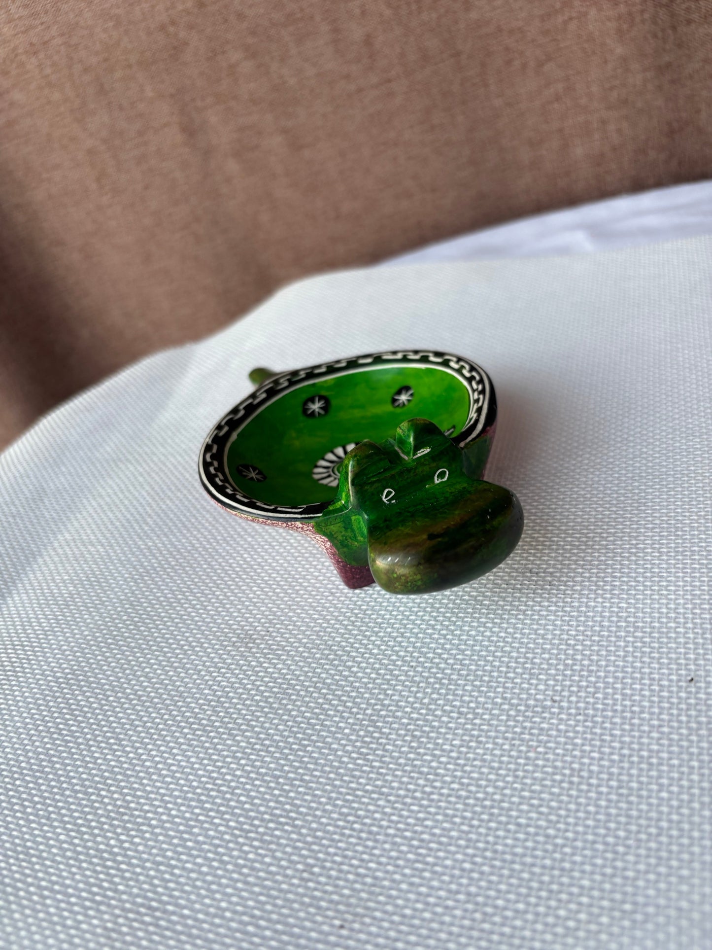 Green hand-painted safari ashtray lifestyle view