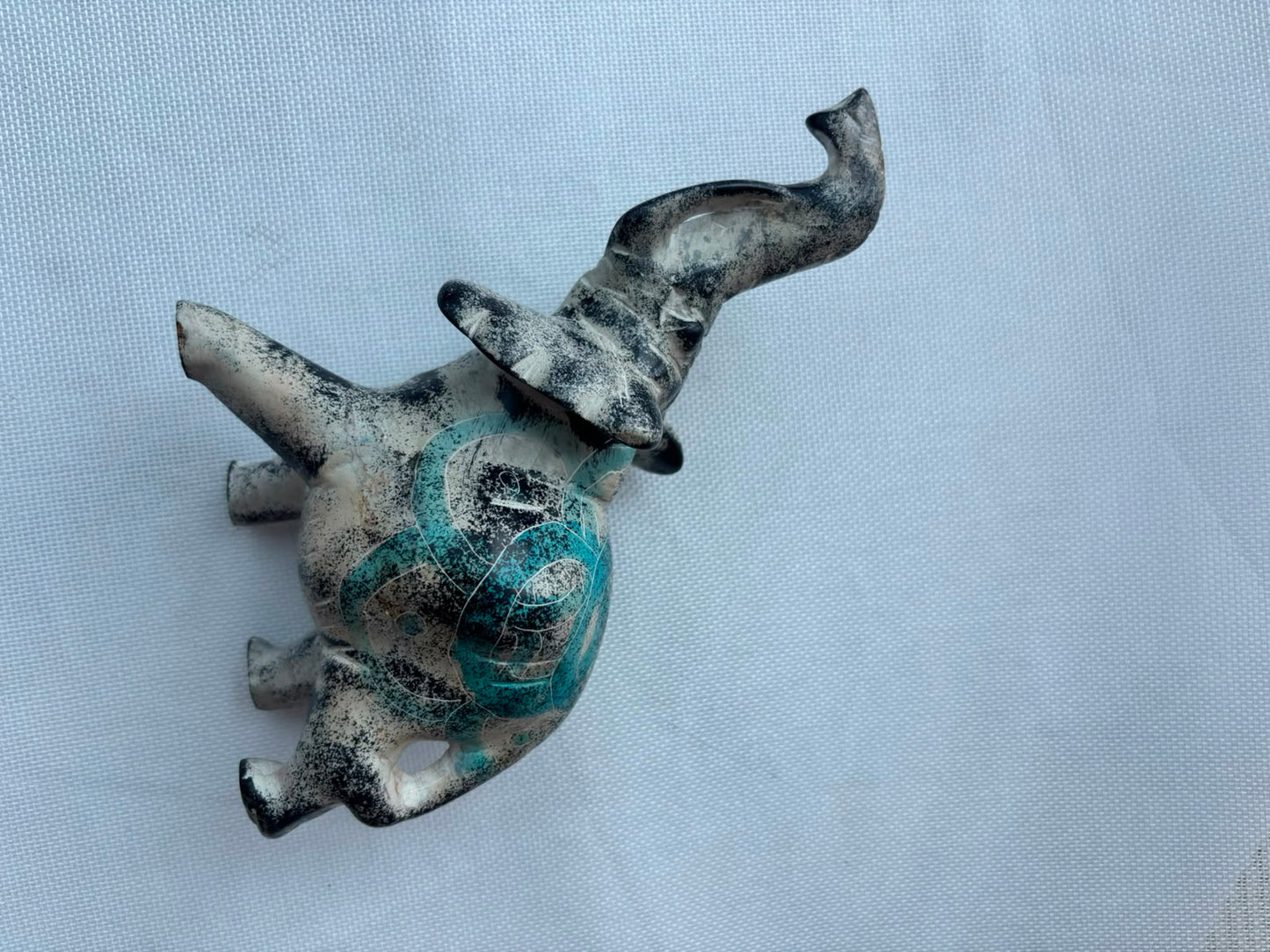 Turquoise patina elephant sculpture side view