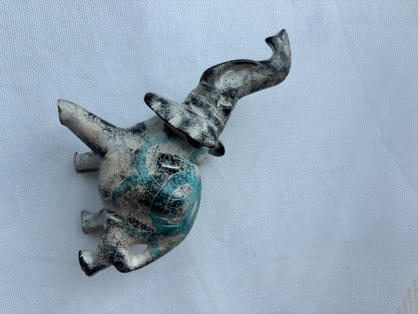 Turquoise patina elephant sculpture side view
