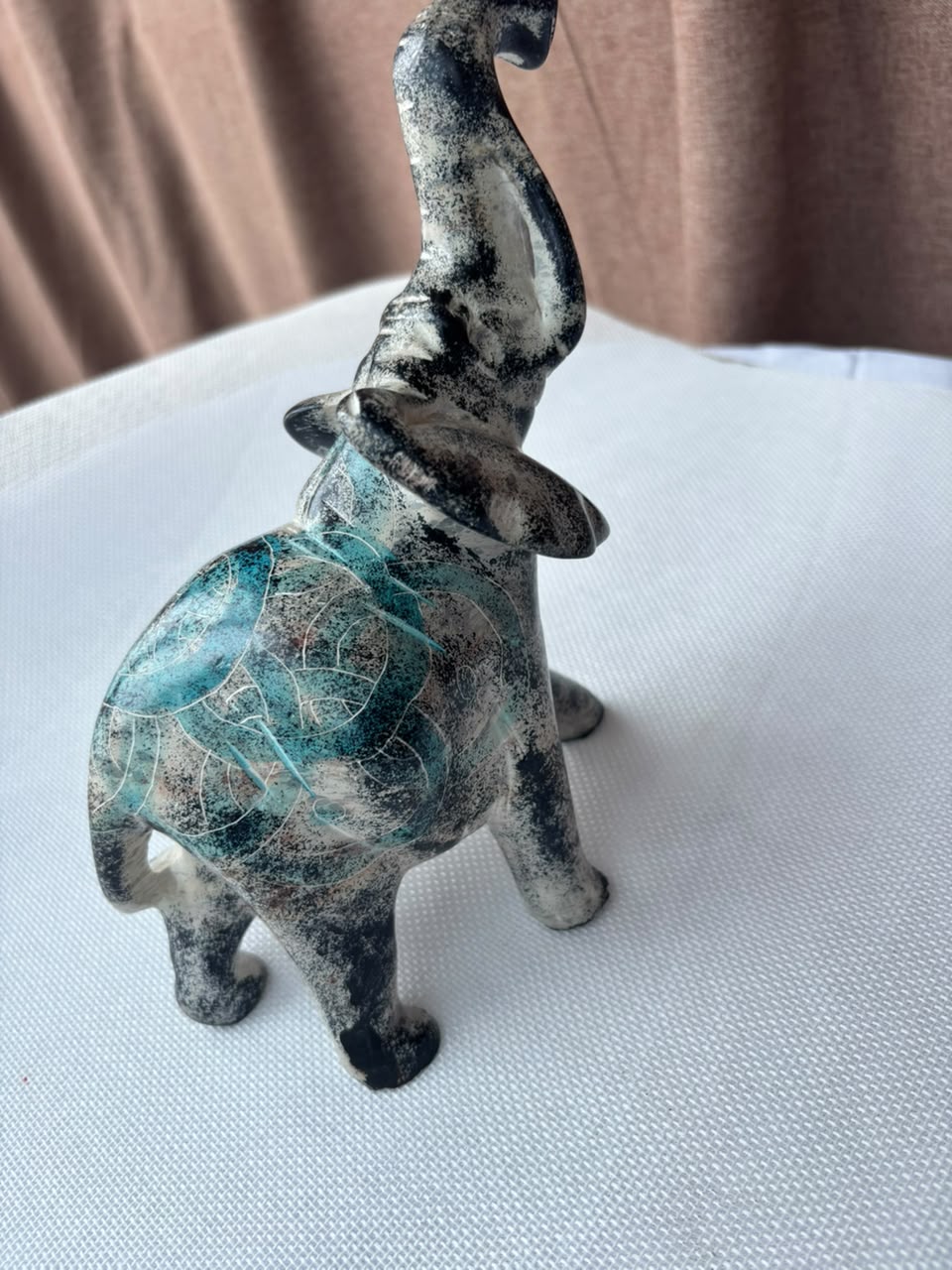 Turquoise patina elephant sculpture rear view