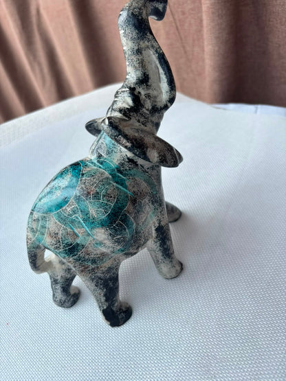 Turquoise patina elephant sculpture rear view