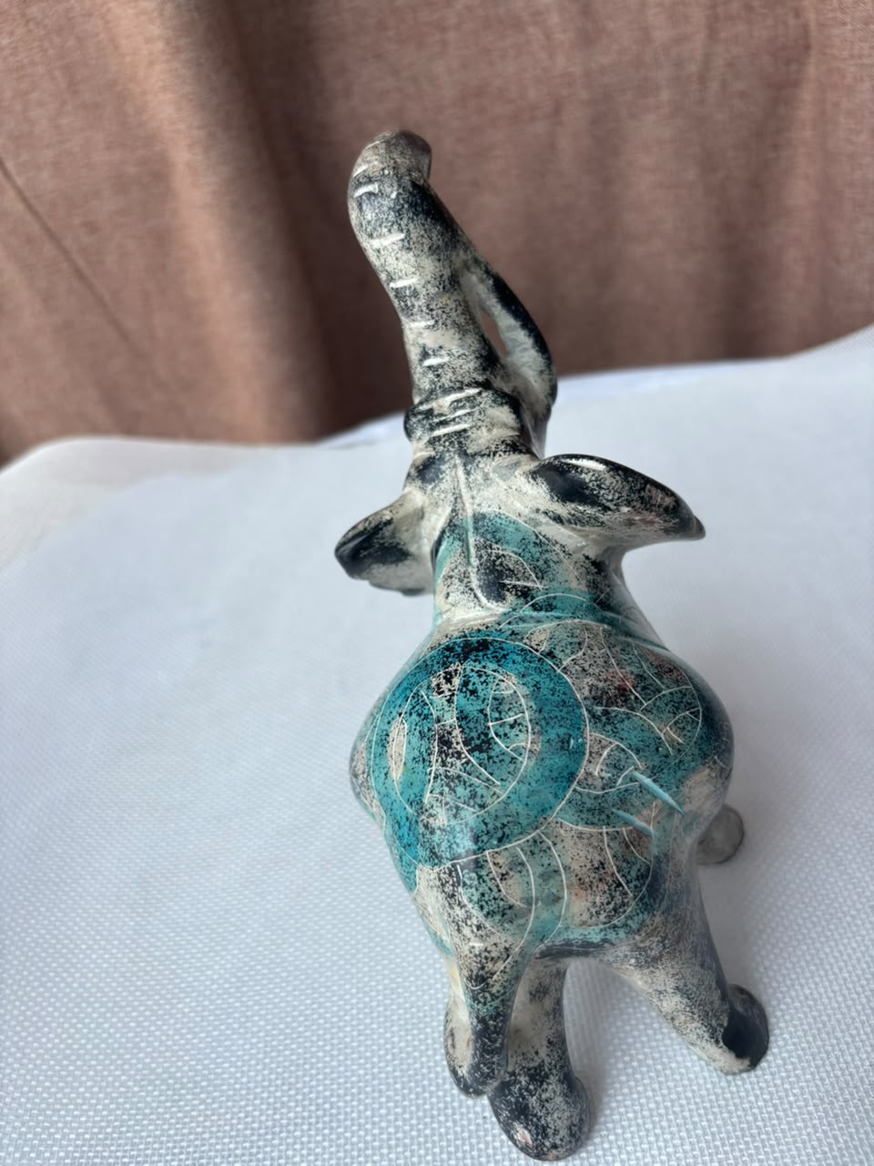 Turquoise patina elephant sculpture front view