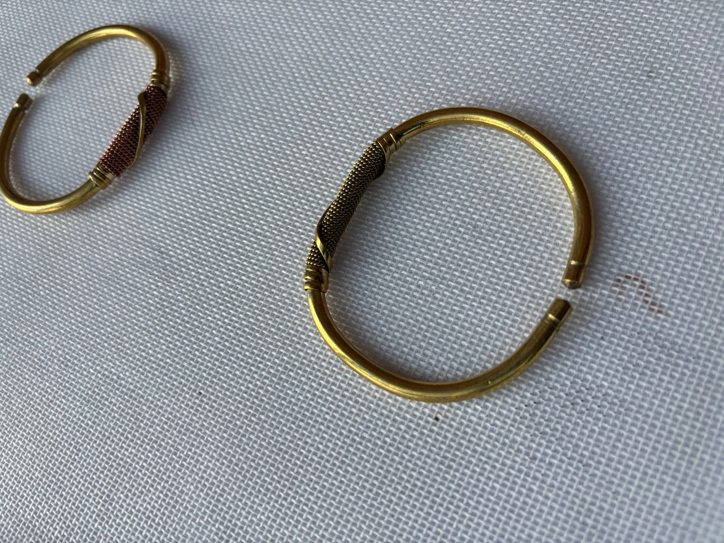 Warm-tone statement cuff bracelets from photographed SAHARA stock