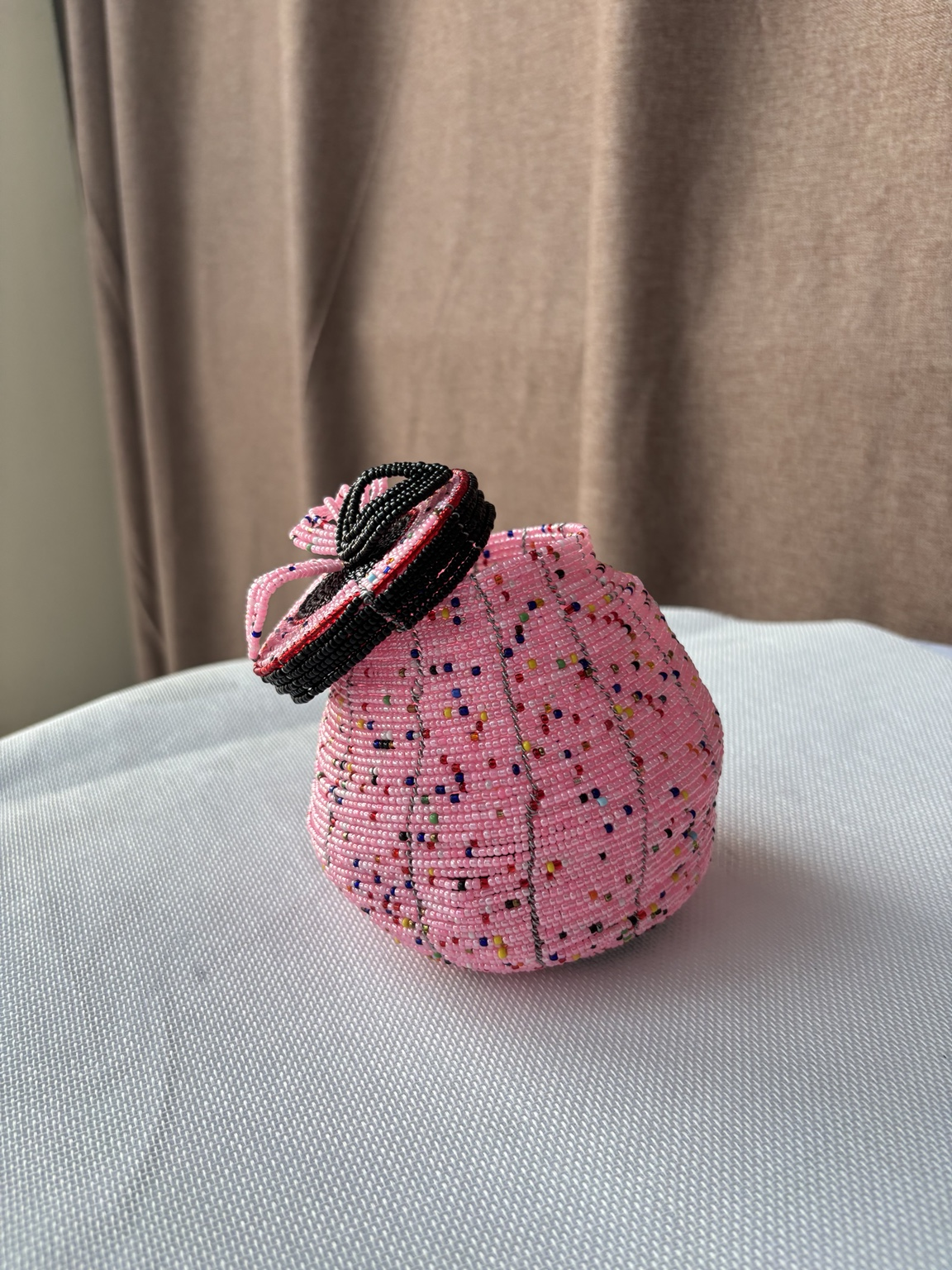 The Savannah Treasure Pot in Blush Pink, handcrafted beaded pot with removable lid